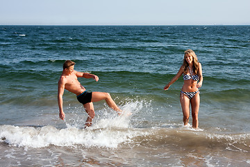 Image showing Couple playing in ocean water