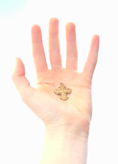 Image showing hand holding cross
