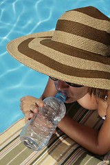 Image showing Drinking by the Pool