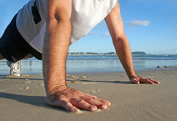 Image showing Pushups On The Beach