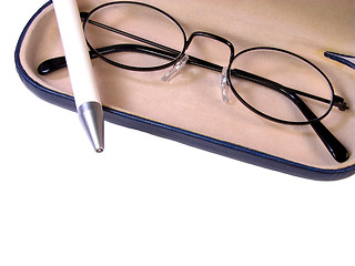 Image showing   Glasses and ball-pen