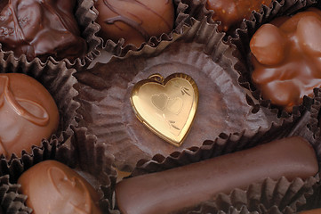 Image showing Gold Heart and Chocolates