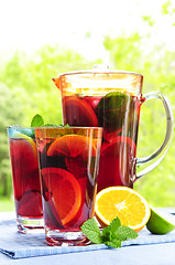 Image showing Fruit punch in pitcher and glasses