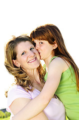 Image showing Mother and daughter hugging
