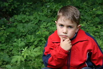 Image showing angry boy with ear ring