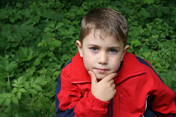 Image showing thinker boy with ear ring