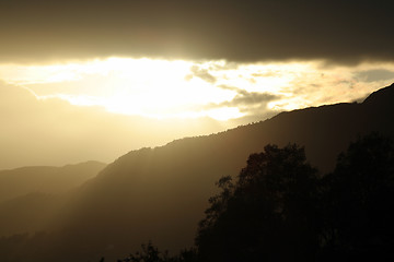 Image showing sky, sun, mountain