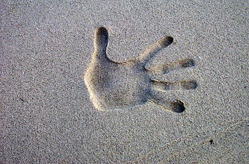 Image showing sand hand punched