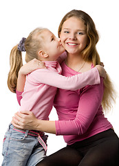 Image showing daughter kisses mum