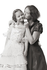 Image showing mother kisses daughter
