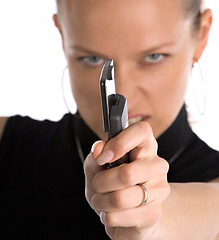 Image showing angry girl with mobile phone