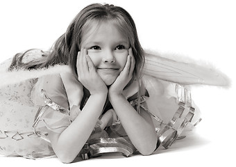 Image showing beautiful girl in white dress lie on floor