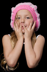 Image showing Beautiful little girl with hands on face