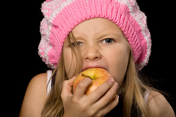 Image showing little girl eating apple