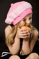 Image showing little girl biting apple