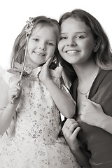 Image showing mother and daughter in festive dresses