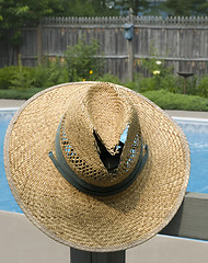 Image showing Old Straw Hat And Swim Pool