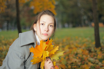 Image showing Girl with leaves