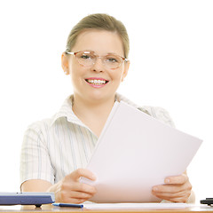 Image showing Smiling businesswoman with blank papers