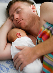 Image showing Baby and father.