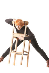 Image showing Funny redhead with stool