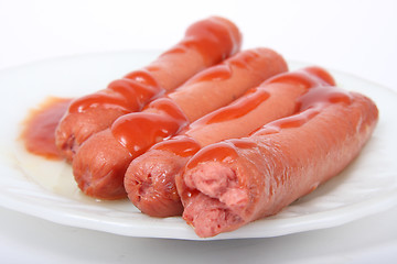 Image showing Hotdogs with ketchup