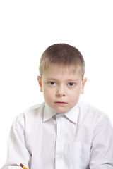 Image showing Boy in white looking stright