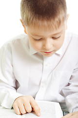 Image showing Schoolboy reading