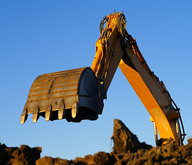 Image showing Shovel bucket against blue sky   