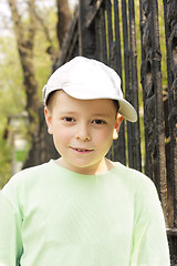 Image showing Boy in green outdoors