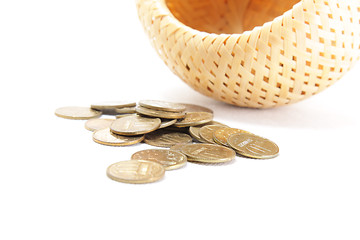 Image showing Bulk coins and basket