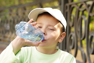 Image showing Boy drinking water