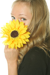 Image showing Hiding behing flower