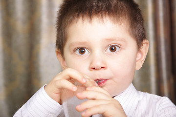 Image showing Drinking with wide eyes