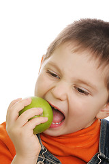 Image showing Biting off apple