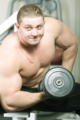 Image showing Man with dumbbels