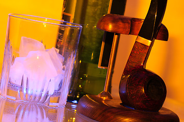 Image showing Ice whisky and pipe