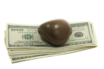 Image showing Dollars under stone