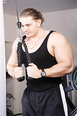 Image showing Big guy at exercise