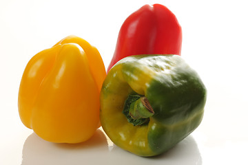 Image showing Three various bellpeppers