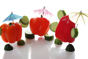 Image showing Three paprika with reflections