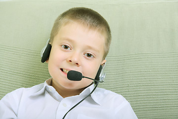 Image showing Boy with headset phone