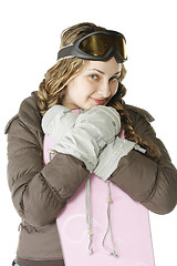 Image showing Girl leaning on snowboard