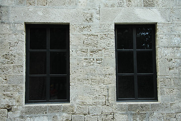 Image showing Two dark windows