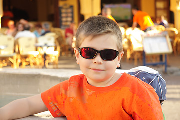 Image showing Photo of boy in sunglasses