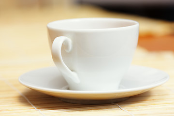 Image showing White cup and saucer