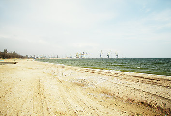 Image showing Sand coast leading to port