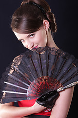 Image showing Woman with fan