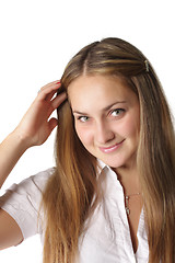 Image showing Girl adjusting hairs