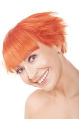 Image showing Smiling widely redhead
